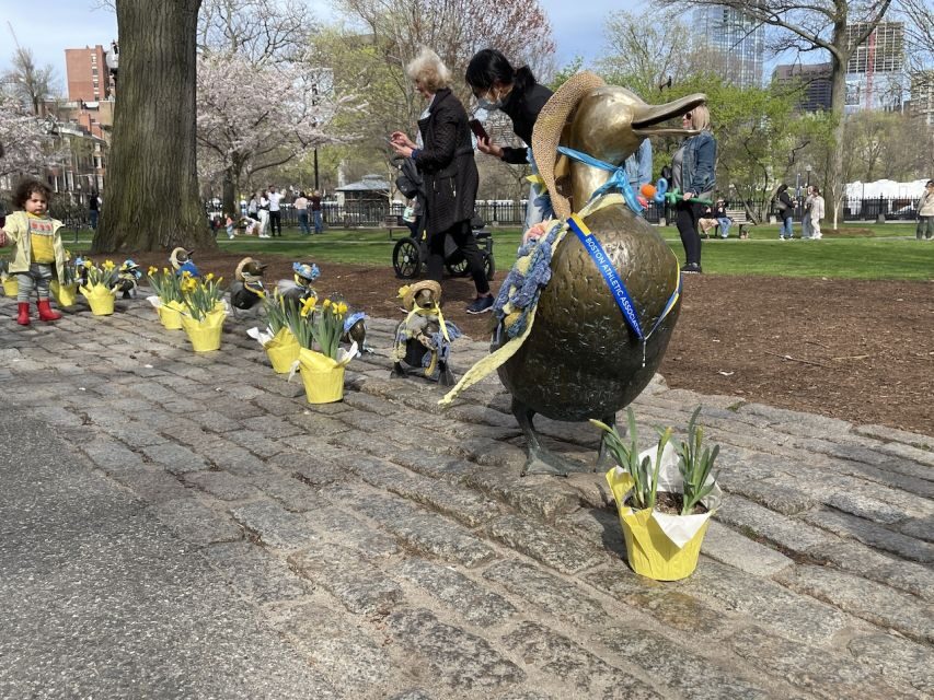 Boston: City History and Highlights Audio App Walking Tour - Quincy Market, street performers, and Samuel Adams at Faneuil Hall