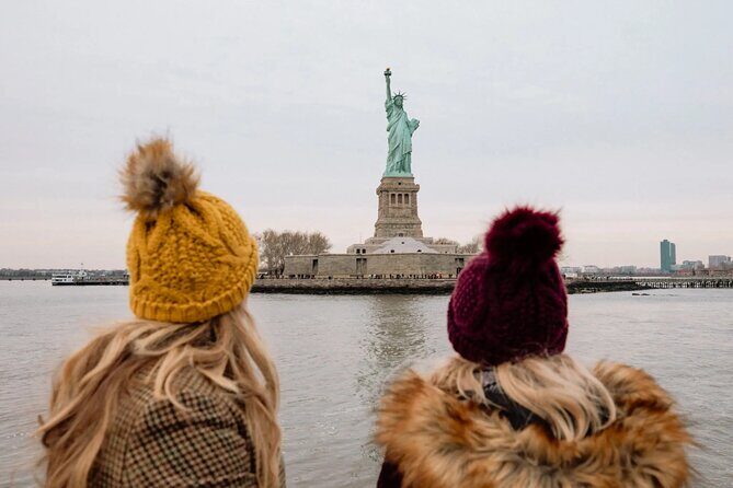 Express Sightseeing Bus Tour with Statue of Liberty Cruise Combo - Downtown and Wall Street: World Trade Center Views and a Big Bull Photo Stop