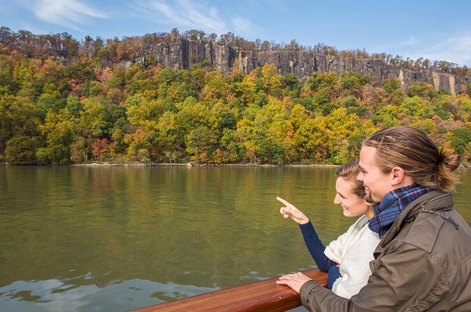 New York Fall Foliage Sail up the Hudson River - Under the George Washington Bridge: the moment the city slips away