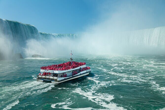 Niagara Falls Express Tour from NYC – US & Canada in One Day - Up close with the falls: cruise in summer, behind-the-falls in winter