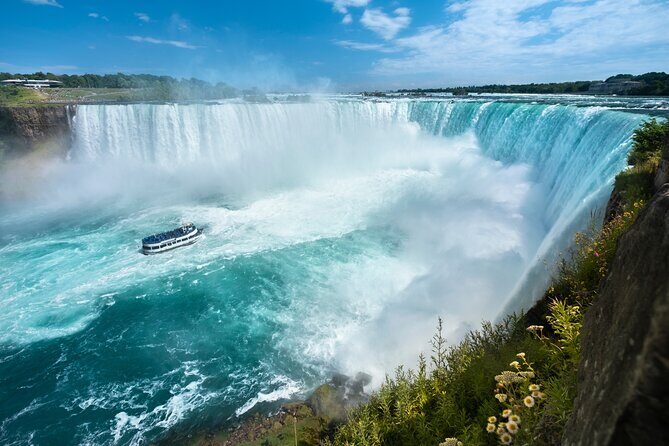 Niagara Falls USA & CANADA Combo Tour With Lunch & Boat - Table Rock, Whirlpool, Floral Clock, and Horseshoe Falls in a single sweep