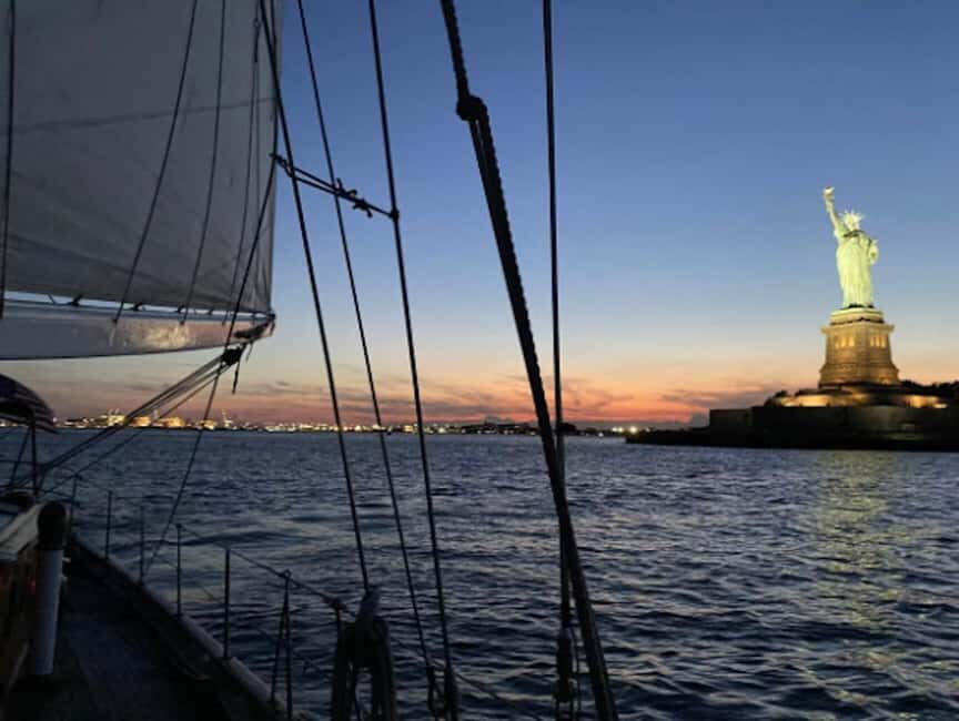 NYC: Clipper City Statue of Liberty City Lights Night Sail - Setting Sail at Night: Liberty and Ellis Island in the Glow