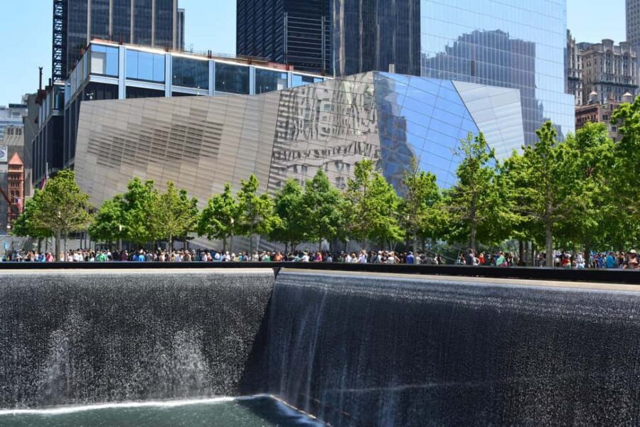 NYC: Downtown, Financial District & Ground Zero Guided Tour - Meeting Under the Orange Statue at Cedar and Broadway