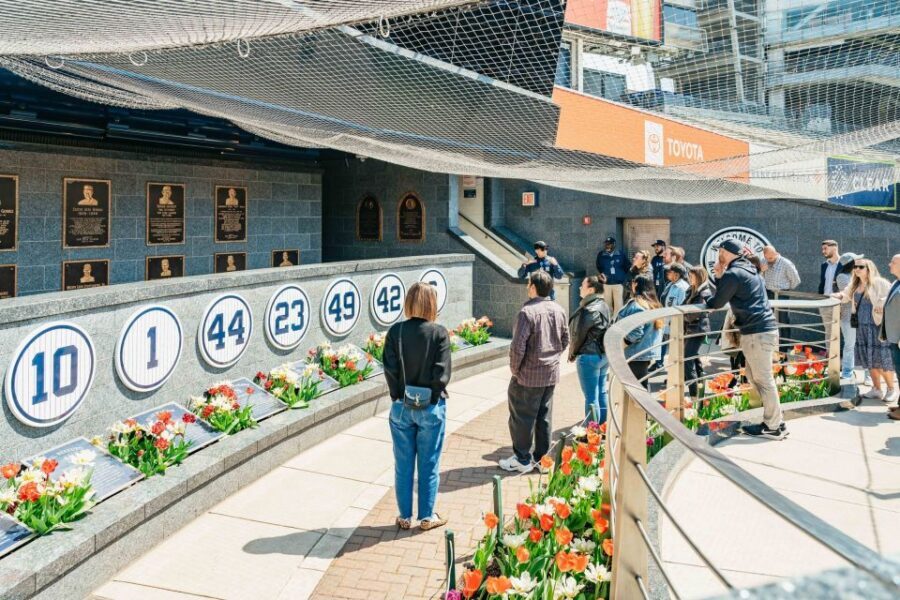 NYC: Harlem & Bronx with Yankees Baseball Game, 1-Day Tour - Crossing to the Bronx: Yankee Stadium grounds, museum time, and Monument Park
