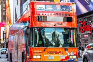 NYC Night Bus Sightseeing Tour with Free Statue of Liberty Cruise - Meeting on West 42nd Street: Where to Start Your Night