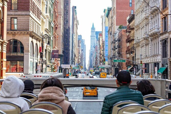NYC Night Bus Sightseeing Tour with Free Statue of Liberty Cruise - Statue of Liberty and Ellis Island: How the Cruise Part Fits In