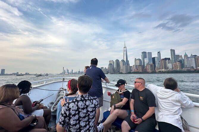Statue of Liberty & Manhattan Skyline Cruise Near Times Square - Live English guide: how to hear the stories (and where to stand)